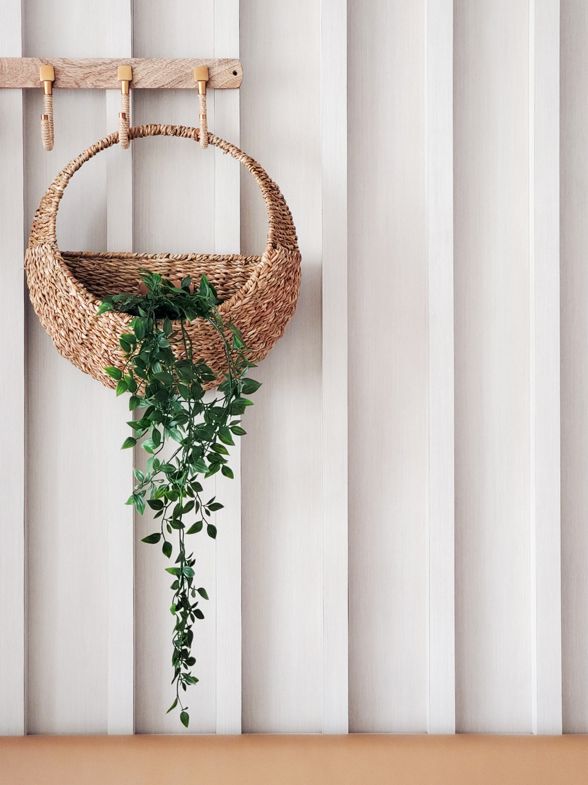 Savar Hanging Planter made of natural seagrass, showcasing its handwoven design and unique texture.