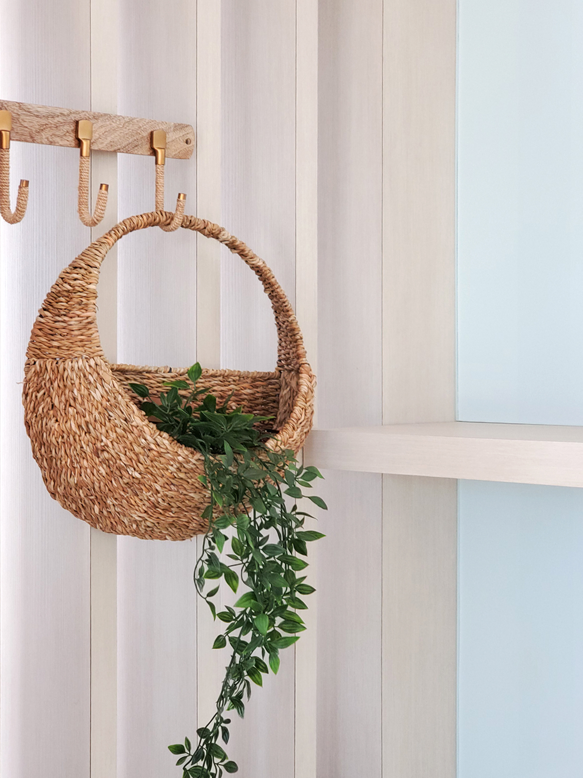 Savar Hanging Planter made of natural seagrass, showcasing its handwoven design and unique texture.