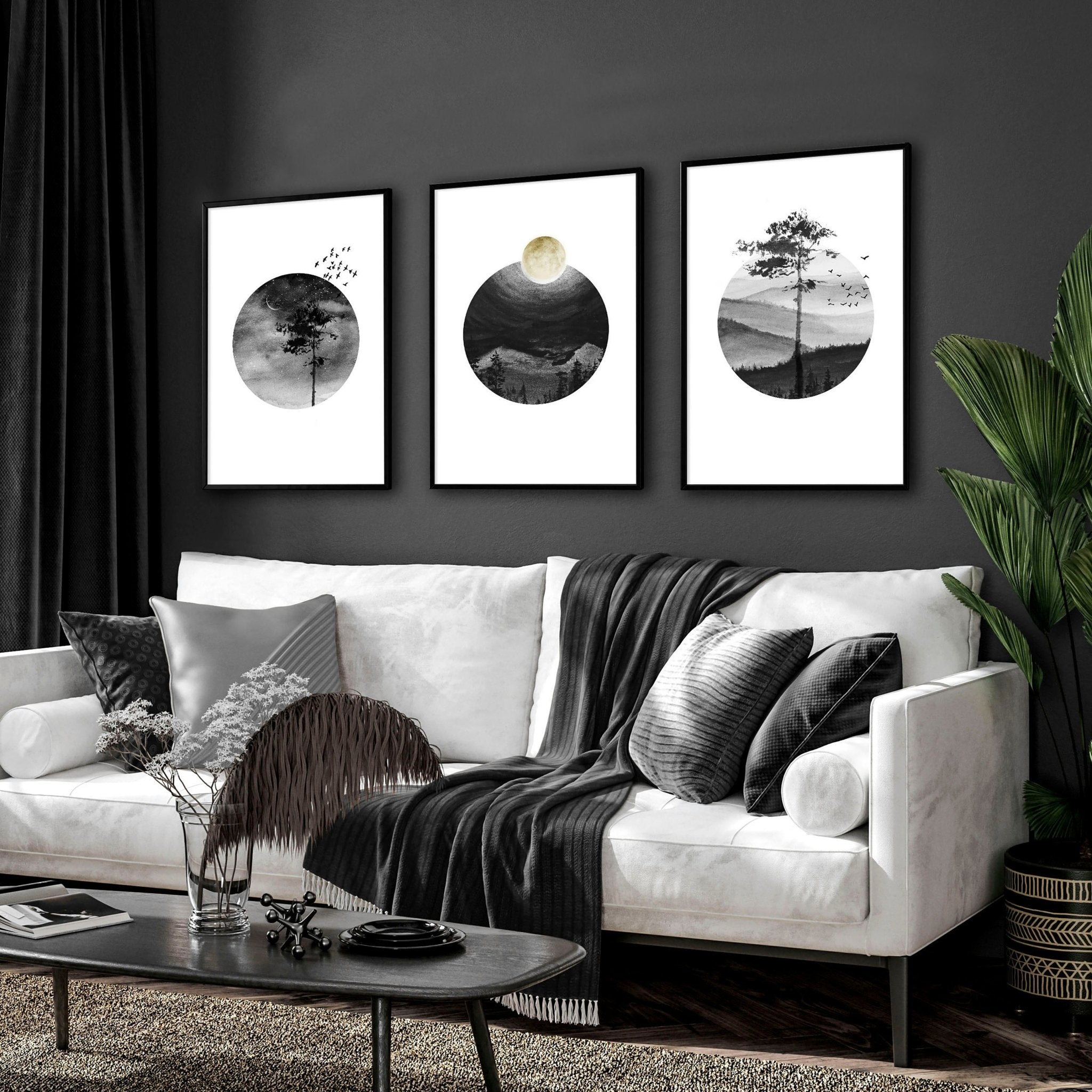 Set of 3 framed Scandi wall art prints featuring greyscale Nordic landscapes in minimal circular designs, perfect for home decor.