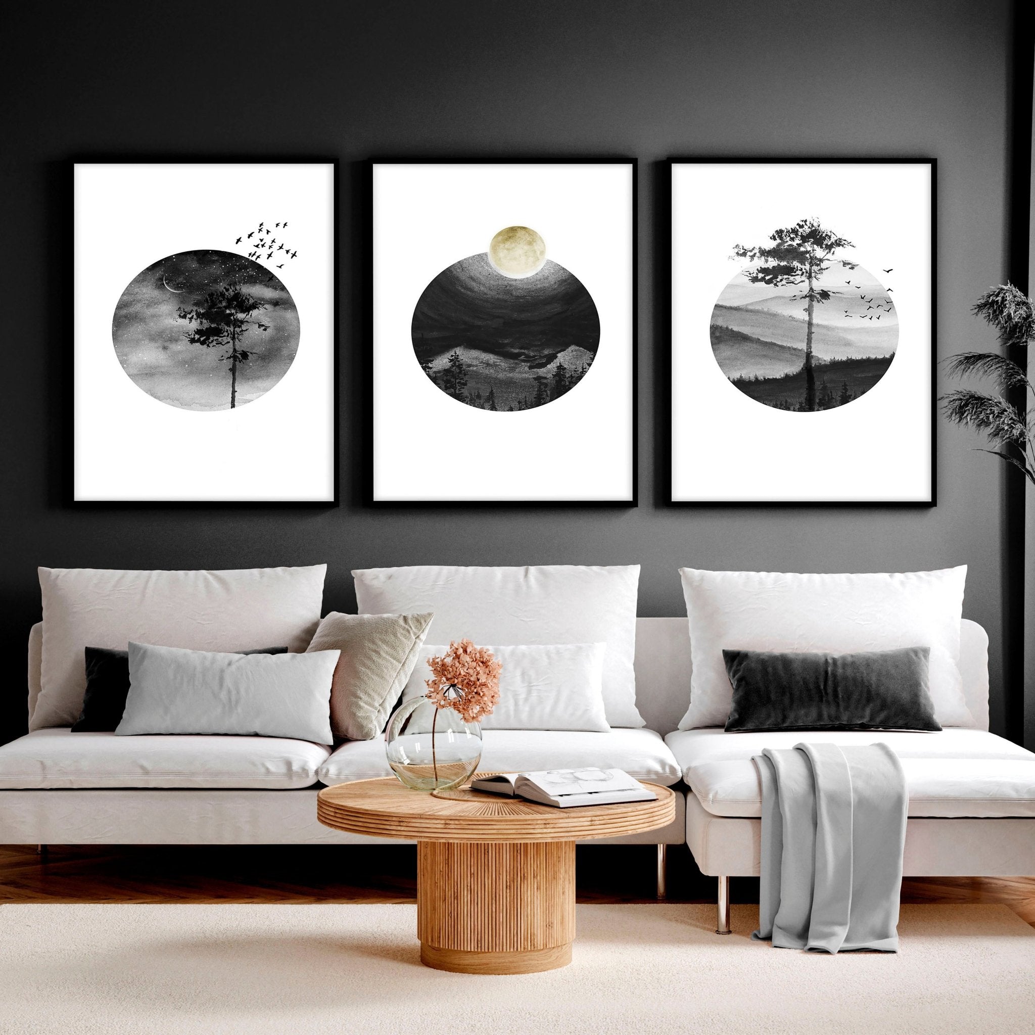 Set of 3 framed Scandi wall art prints featuring greyscale Nordic landscapes in minimal circular designs, perfect for home decor.