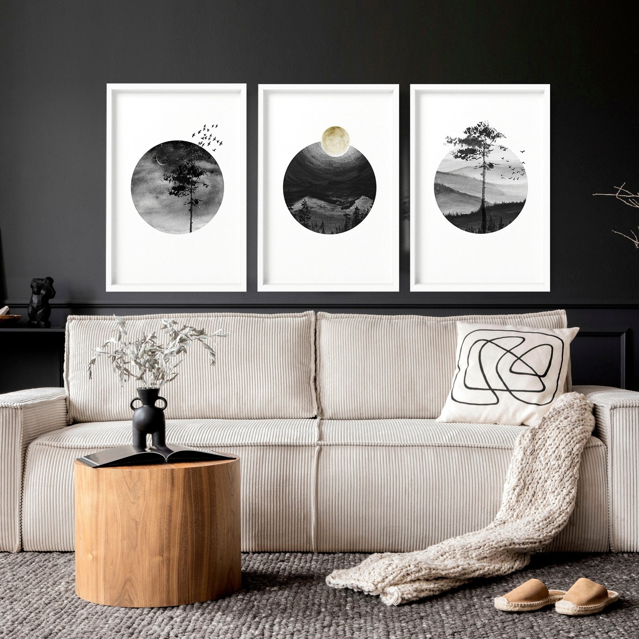 Set of 3 framed Scandi wall art prints featuring greyscale Nordic landscapes in minimal circular designs, perfect for home decor.