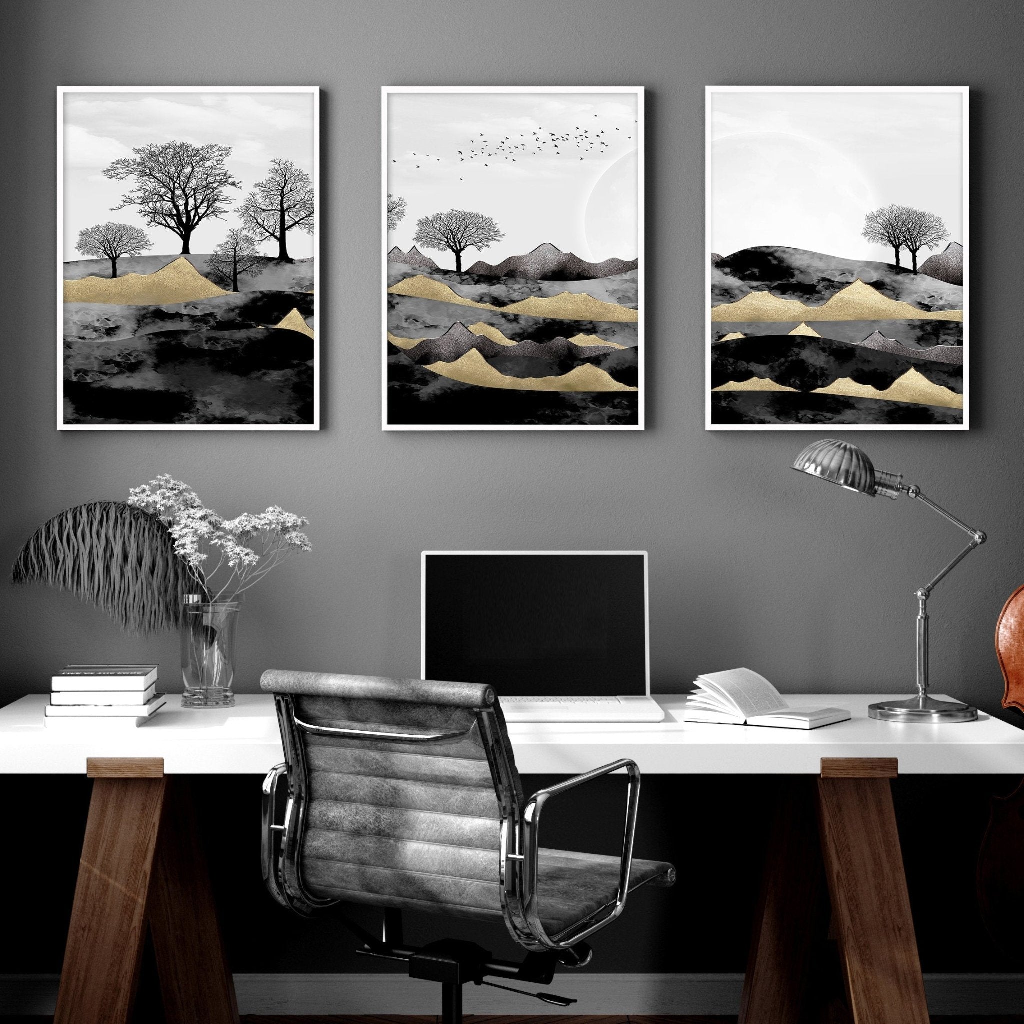 Set of 3 Scandinavian wall art prints featuring a Dark Nordic Forest Landscape, showcasing minimalistic design with black, grey, and gold tones.