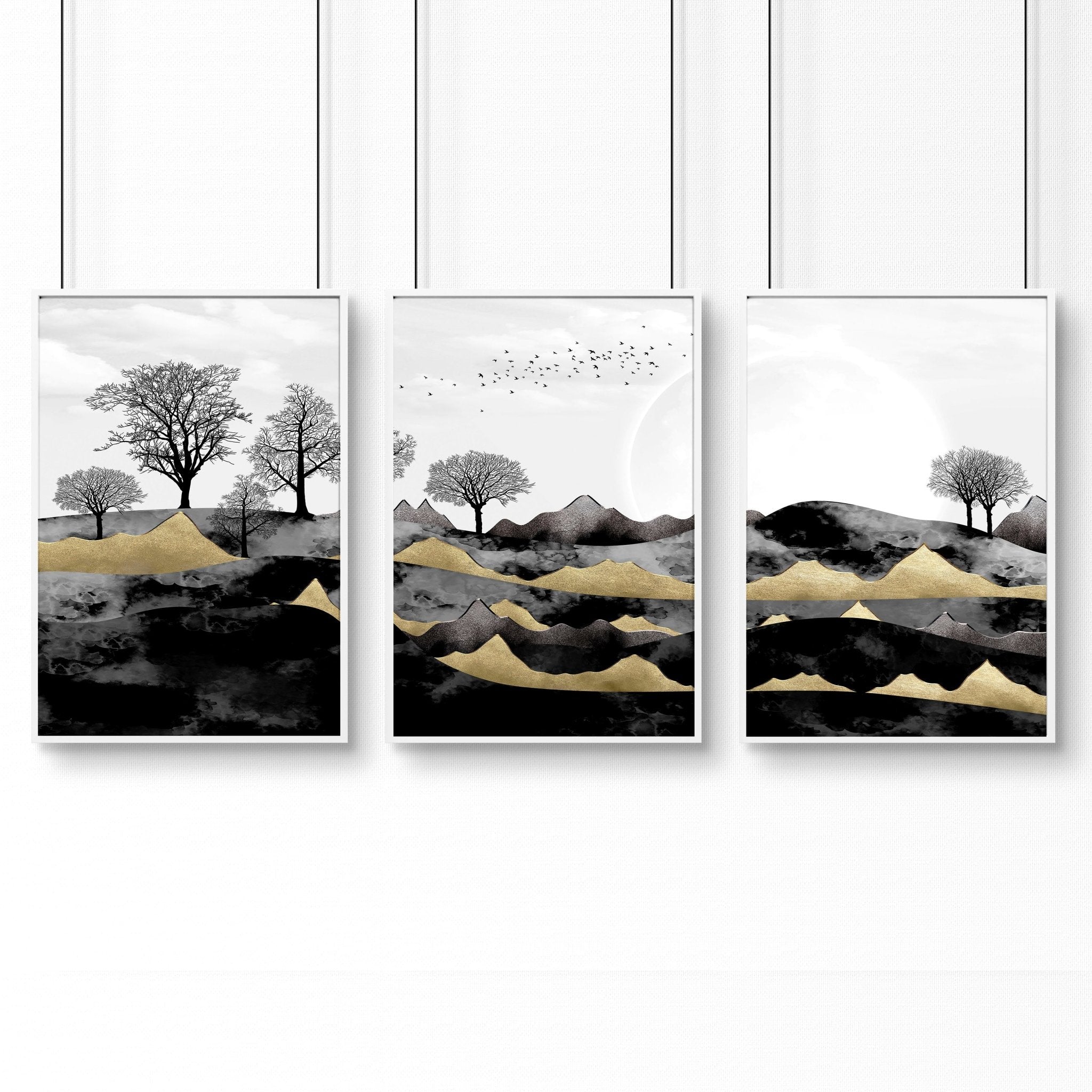 Set of 3 Scandinavian wall art prints featuring a Dark Nordic Forest Landscape, showcasing minimalistic design with black, grey, and gold tones.