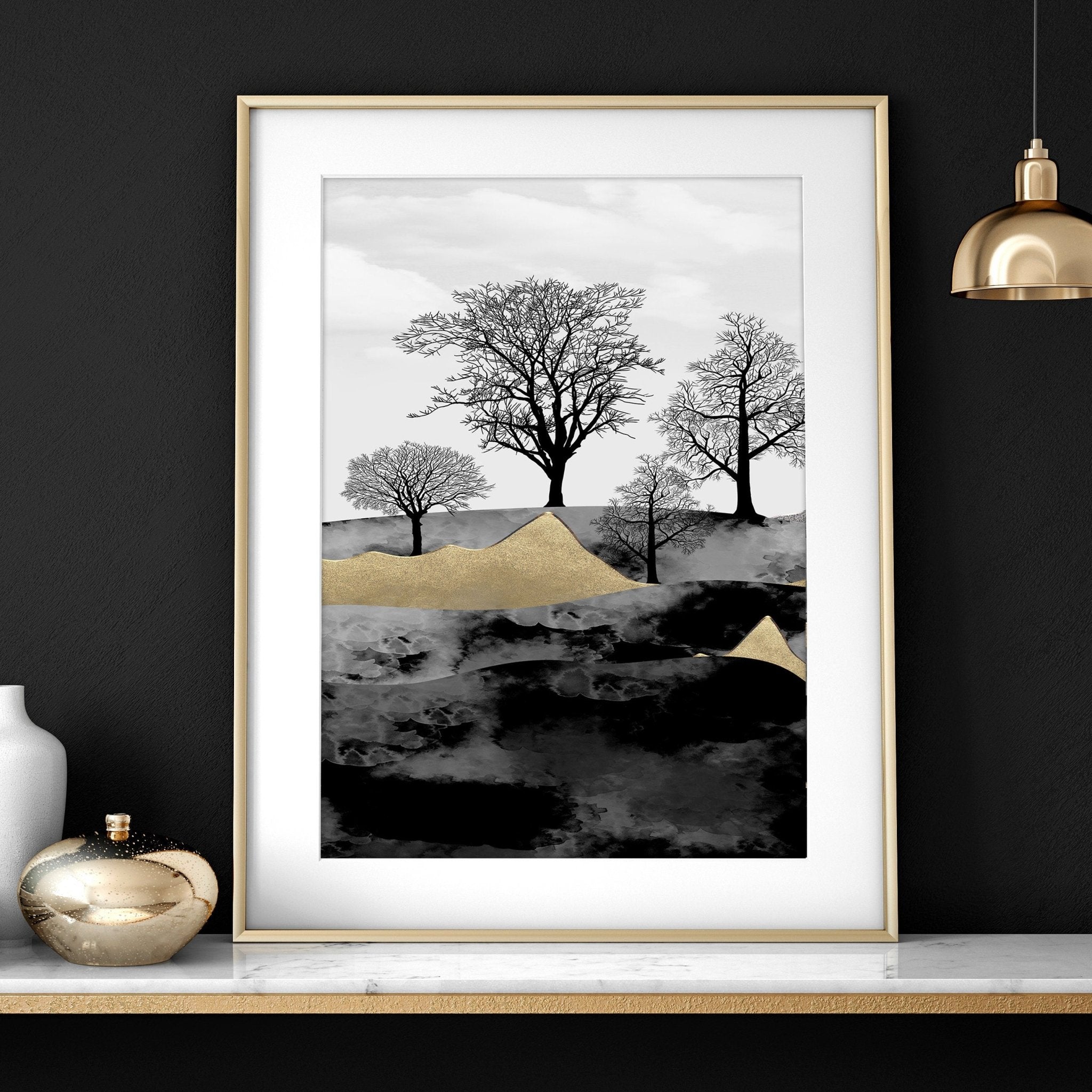 Set of 3 Scandinavian wall art prints featuring a Dark Nordic Forest Landscape, showcasing minimalistic design with black, grey, and gold tones.