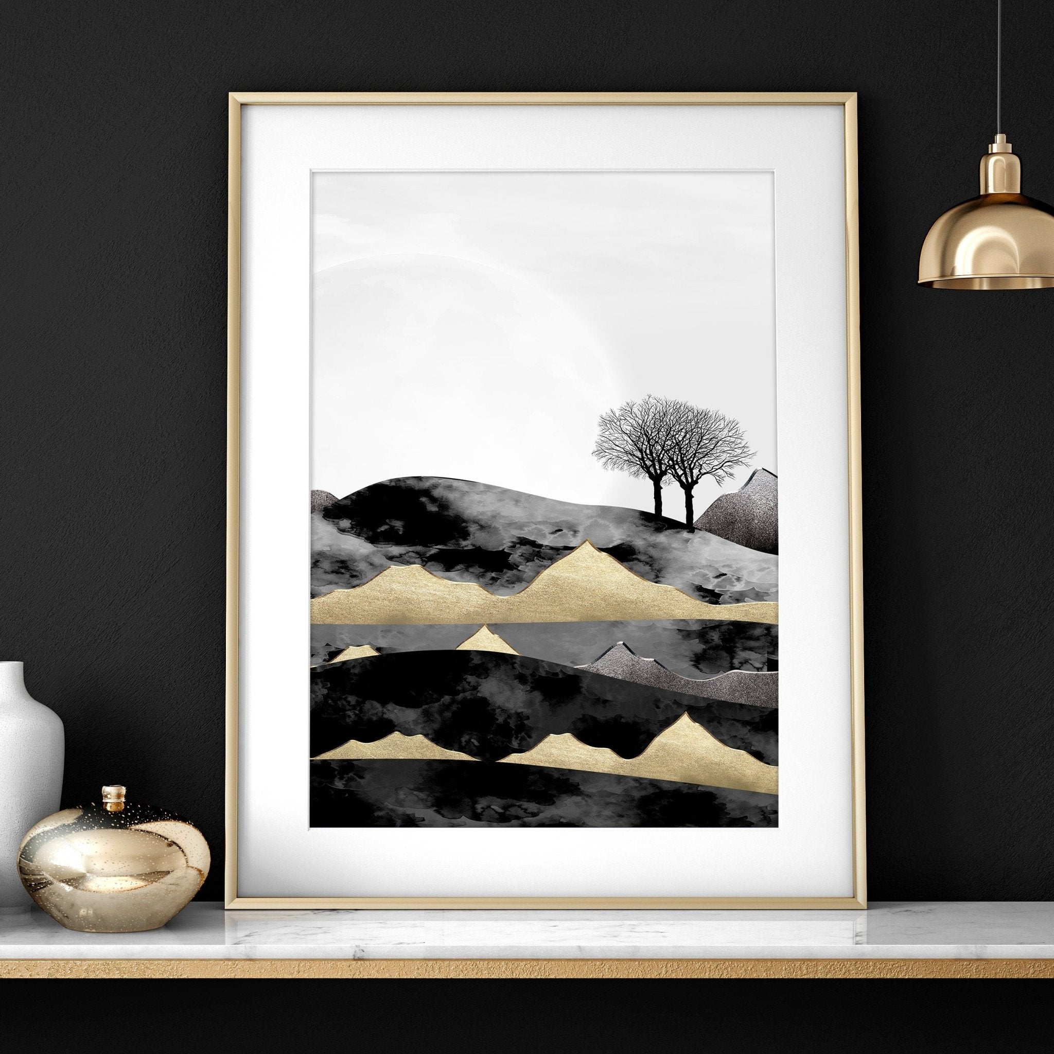 Set of 3 Scandinavian wall art prints featuring a Dark Nordic Forest Landscape, showcasing minimalistic design with black, grey, and gold tones.