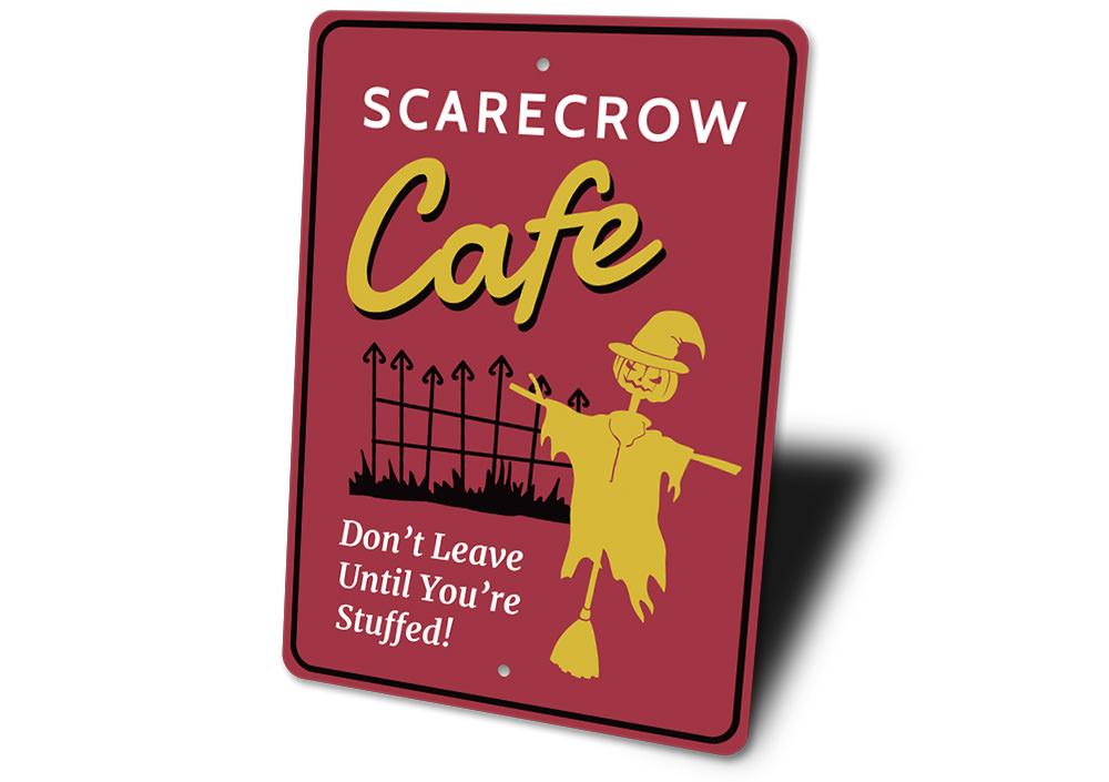 "Scarecrow Cafe sign, humorous tagline."