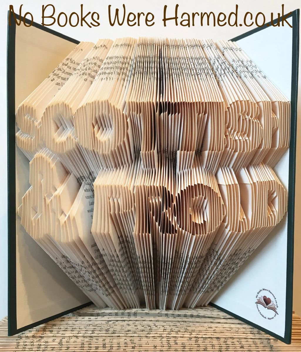 Handcrafted Scottish & Proud book art made from vintage books, showcasing intricate folded designs and unique colors.