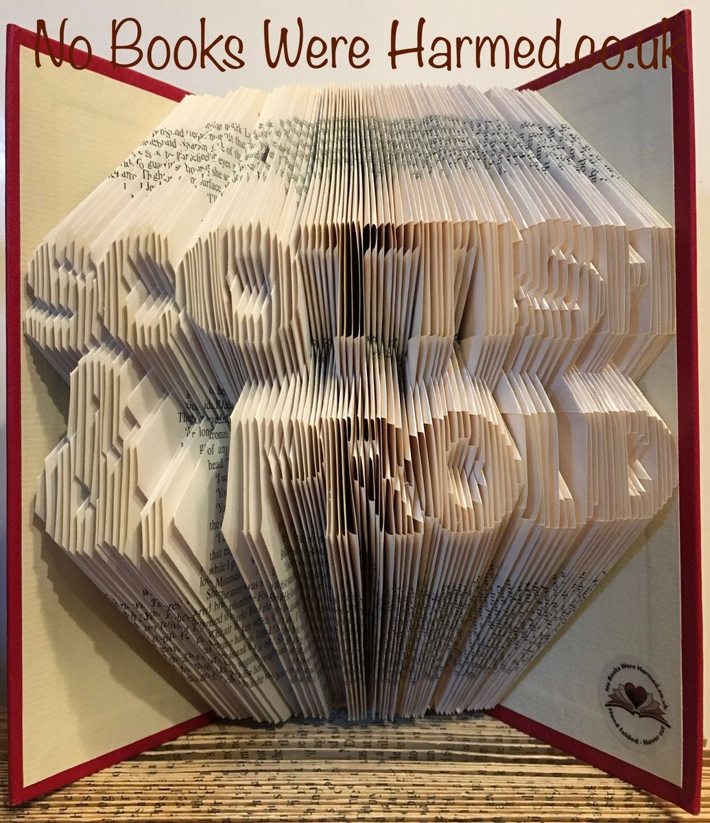 Handcrafted Scottish & Proud book art made from vintage books, showcasing intricate folded designs and unique colors.