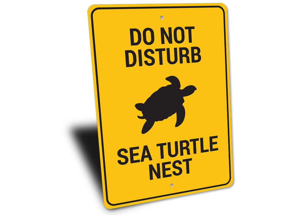 A beautifully crafted Sea Turtle Nest Sign made of high-quality aluminum, featuring a vibrant design perfect for beach-themed decor.