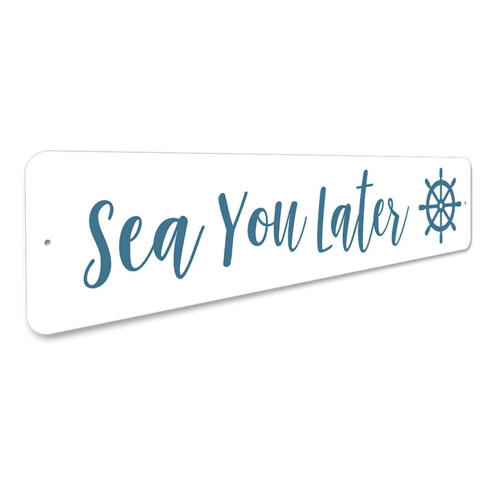 A decorative Sea You Later Sign made of durable aluminum, featuring a beach-themed design perfect for coastal decor.