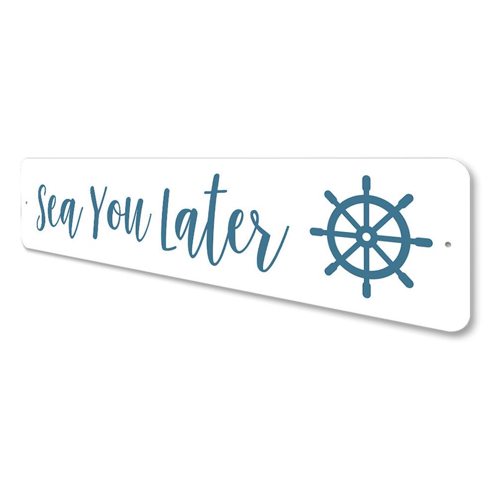 A decorative Sea You Later Sign made of durable aluminum, featuring a beach-themed design perfect for coastal decor.