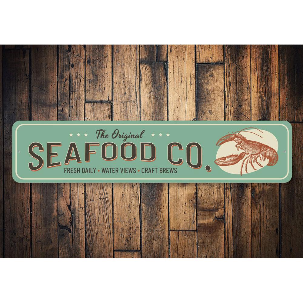 A decorative Seafood Company Sign made of high-quality aluminum, featuring a beach-themed design suitable for coastal homes and restaurants.