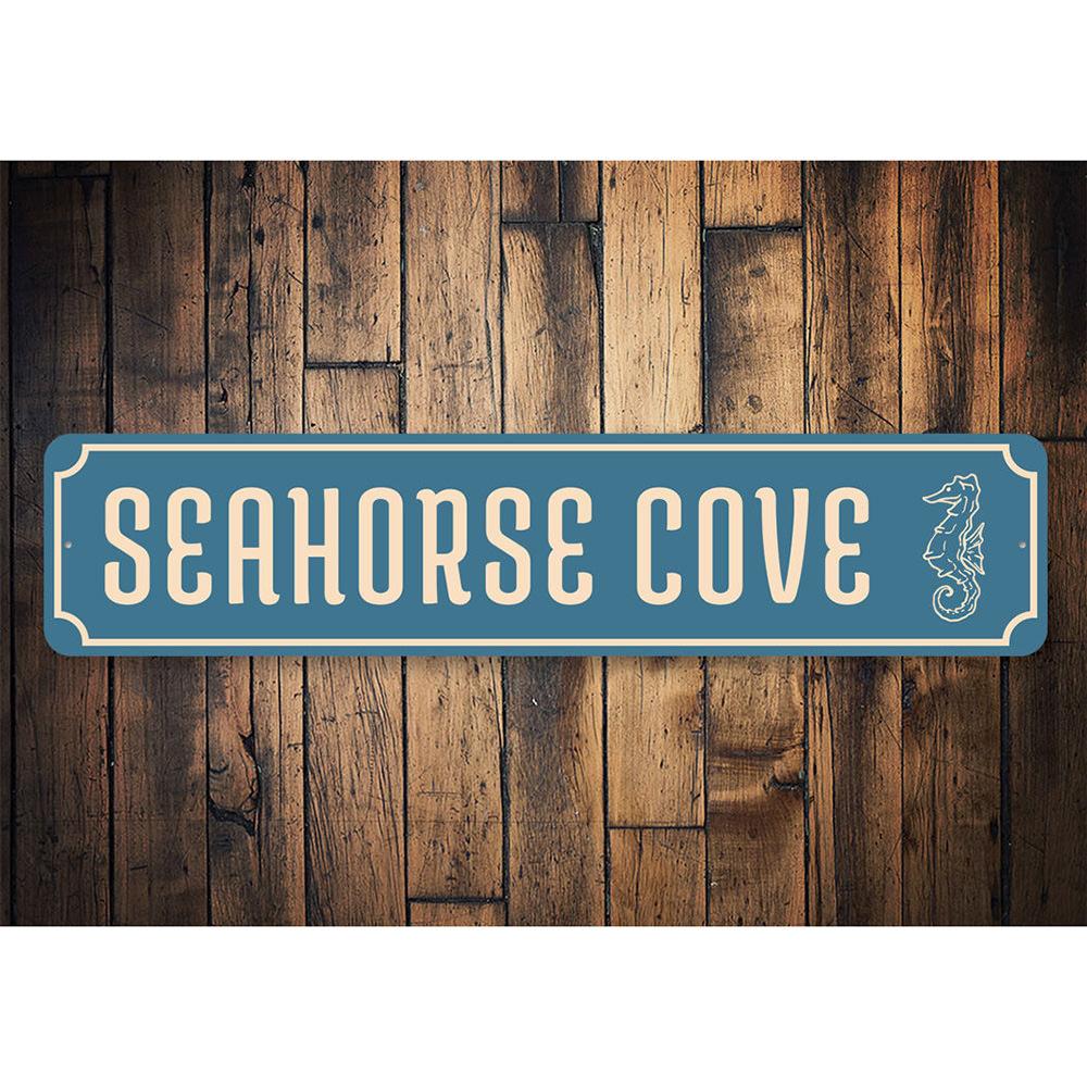 Seahorse Cove Sign featuring a vibrant seahorse design, perfect for coastal decor, made from high-quality aluminum.