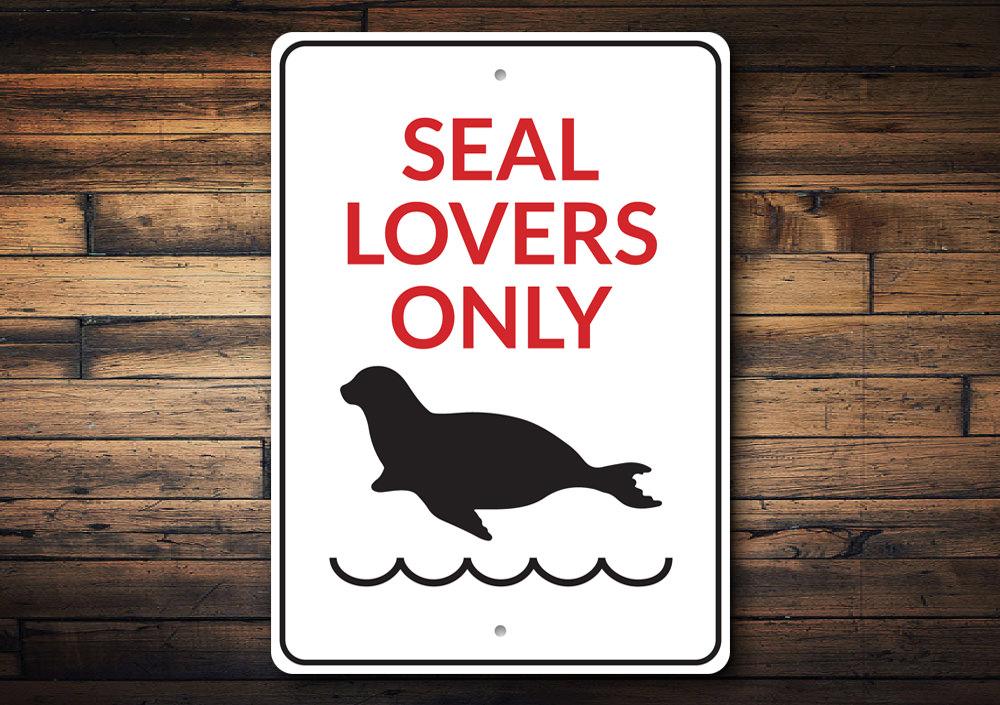 Seal Lovers Only Sign made of high-quality aluminum, featuring a beach-themed design, perfect for coastal decor.