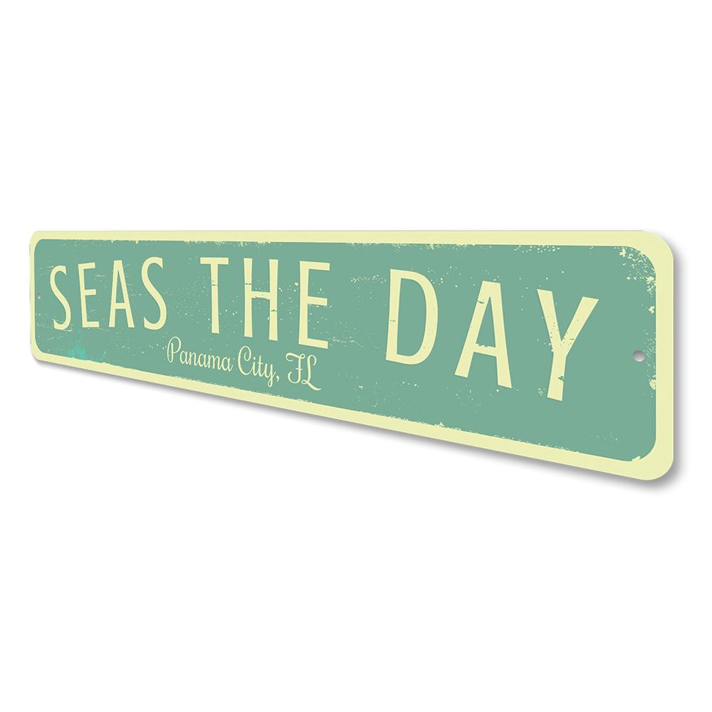 Seas The Day Location Sign featuring vibrant coastal design, made of durable aluminum, perfect for beach-themed decor.