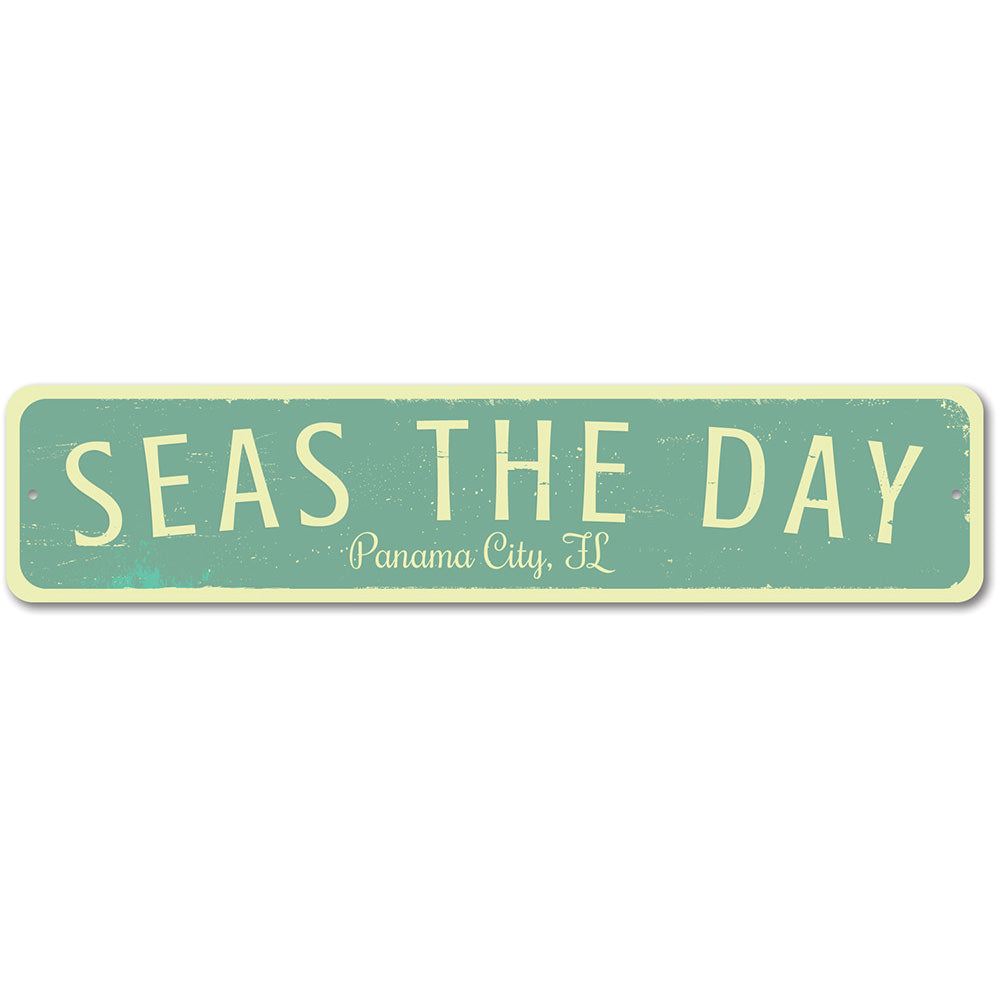 Seas The Day Location Sign featuring vibrant coastal design, made of durable aluminum, perfect for beach-themed decor.