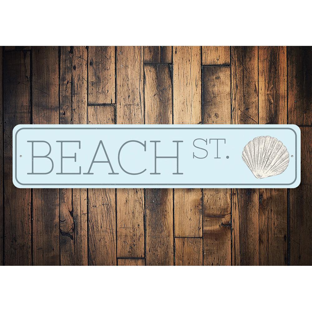 Seashell Beach Street Sign made of high-quality aluminum, featuring a coastal design perfect for beach-themed decor.