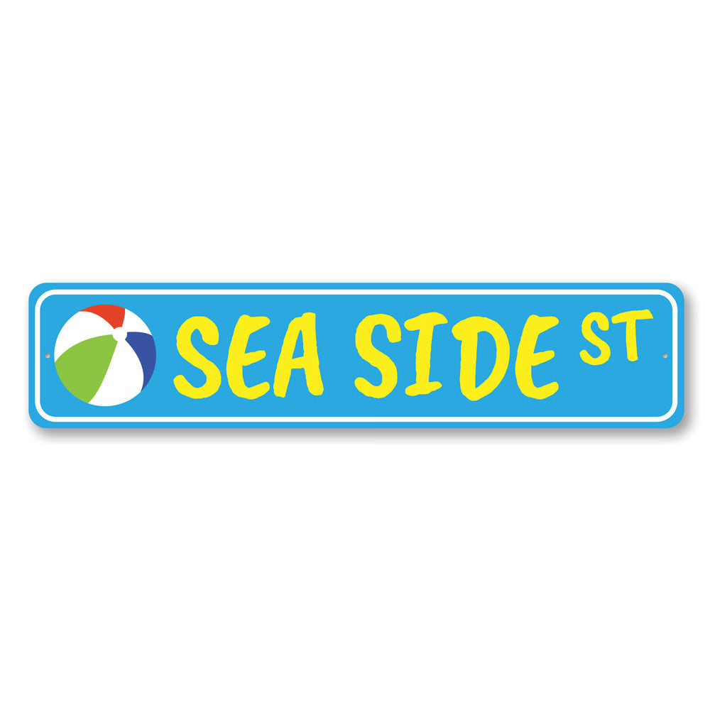 A decorative Seaside Street Sign made of high-quality aluminum, featuring vibrant colors and customizable text, perfect for beach-themed decor.