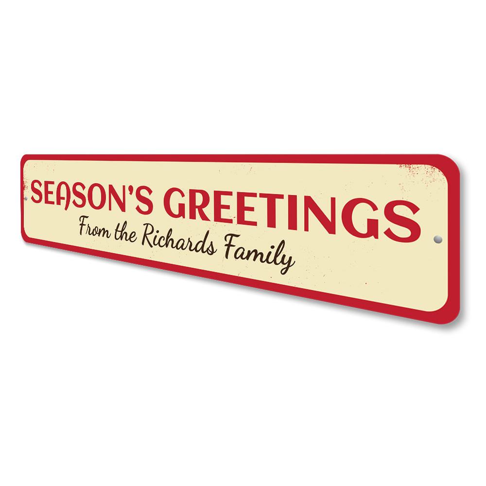 A festive Season's Greetings Family Name Sign made of high-quality aluminum, featuring customizable text for a personal touch, perfect for holiday decor.