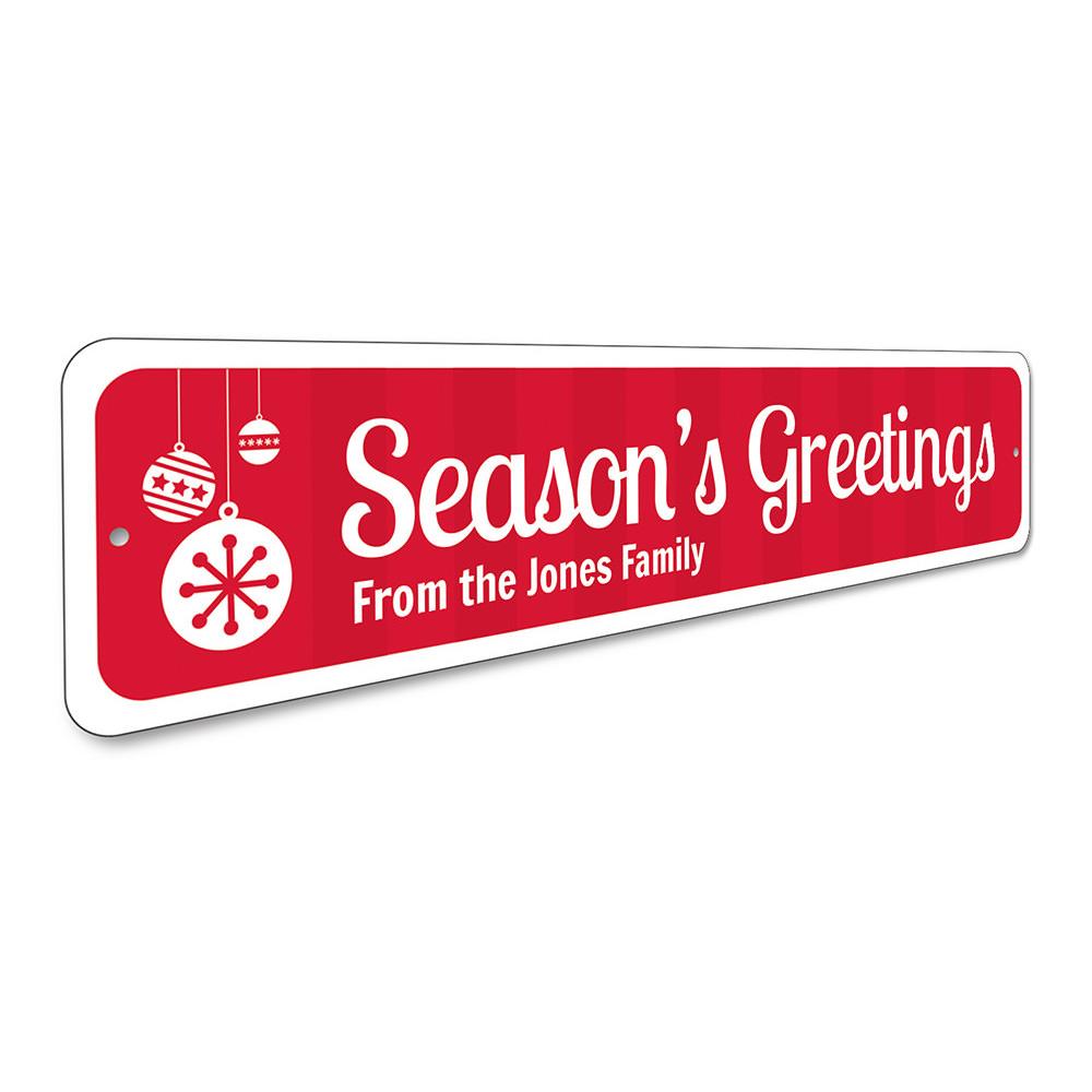 Red "Season's Greetings" holiday sign