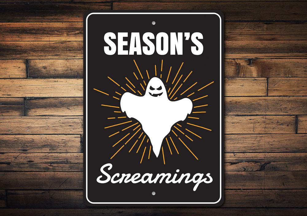 Season's Screamings Sign featuring spooky Halloween design, made from high-quality aluminum, perfect for indoor and outdoor decoration.