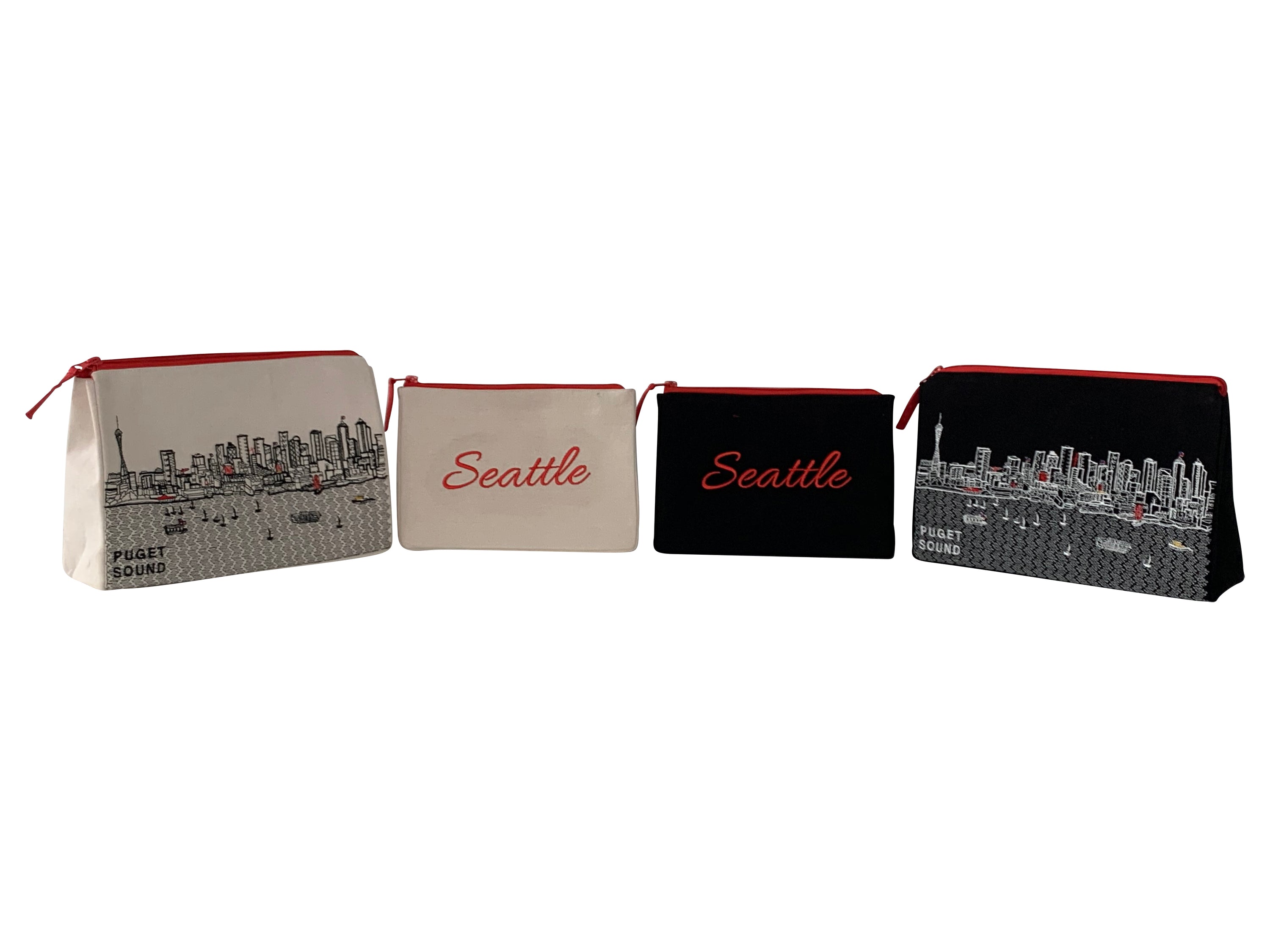 Seattle Makeup Bag set featuring embroidered skyline on cream and black cotton canvas with red waterproof lining.