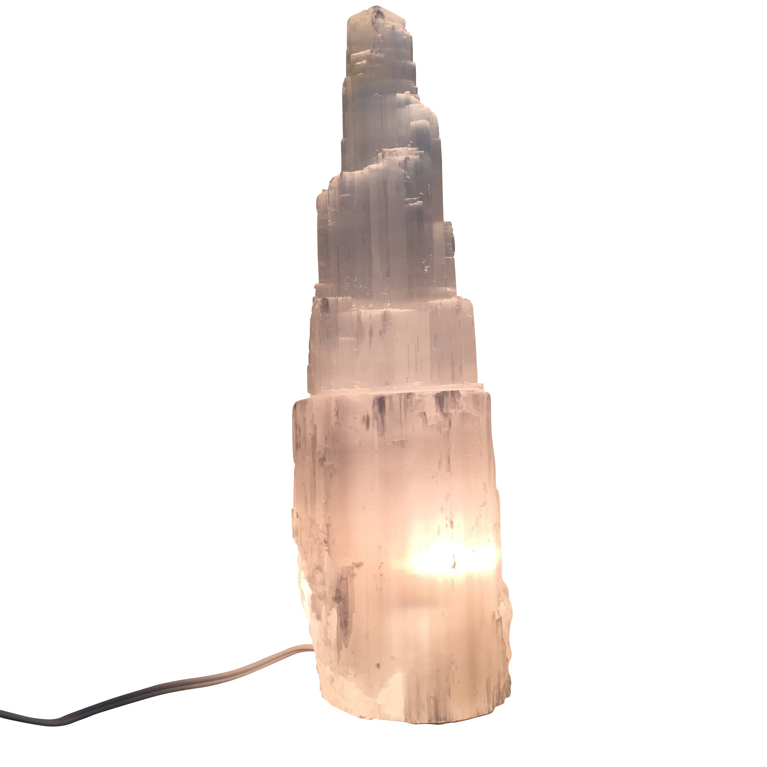 A beautifully handcrafted Selenite Crystal Skyscraper Lamp, showcasing its unique shape and natural glow.