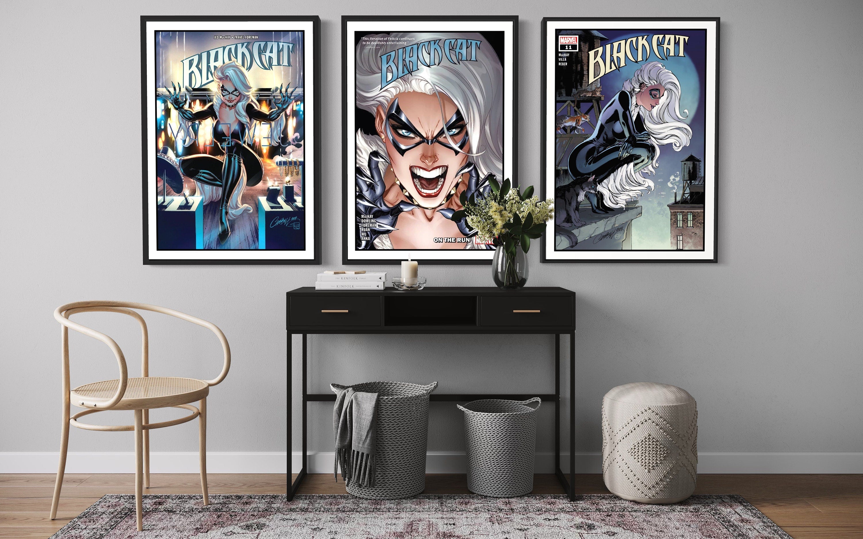 Set of 3 Black Cat comic cover prints showcasing vibrant artwork and dynamic poses of the character.