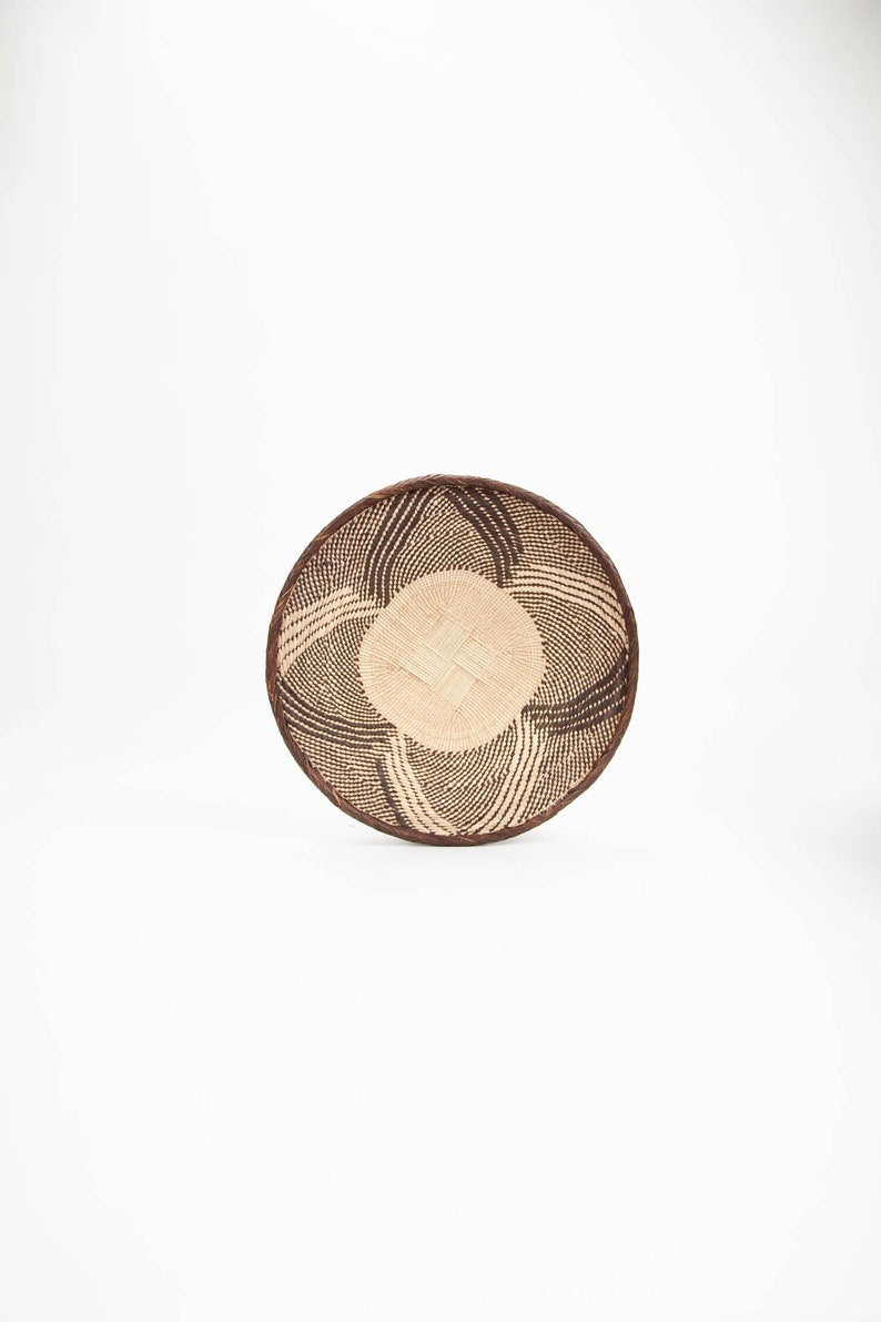 Set of 5 Binga Woven African Baskets showcasing unique patterns and natural colors, perfect for home decor.