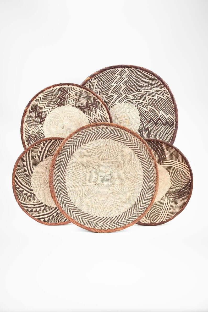 Set of 5 Binga Woven African Baskets showcasing unique patterns and natural colors, perfect for home decor.