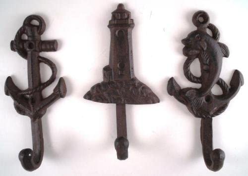 Set of 6 Nautical Cast Iron Wall Hooks featuring unique designs like Lighthouse, Dolphin, Anchor, Starfish, Seahorse, and Sea Shell.