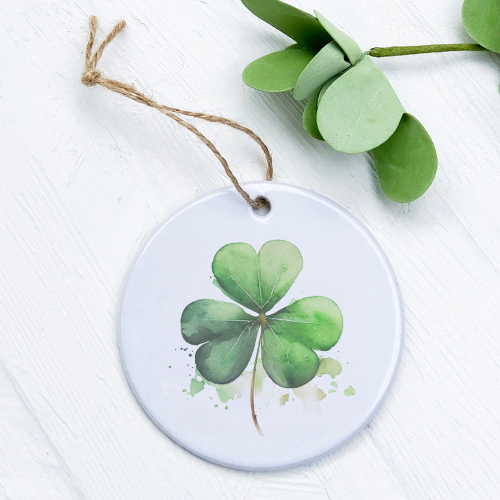 Shamrock Ornament made of high-quality porcelain with a vibrant design, measuring 2.75 inches in diameter.