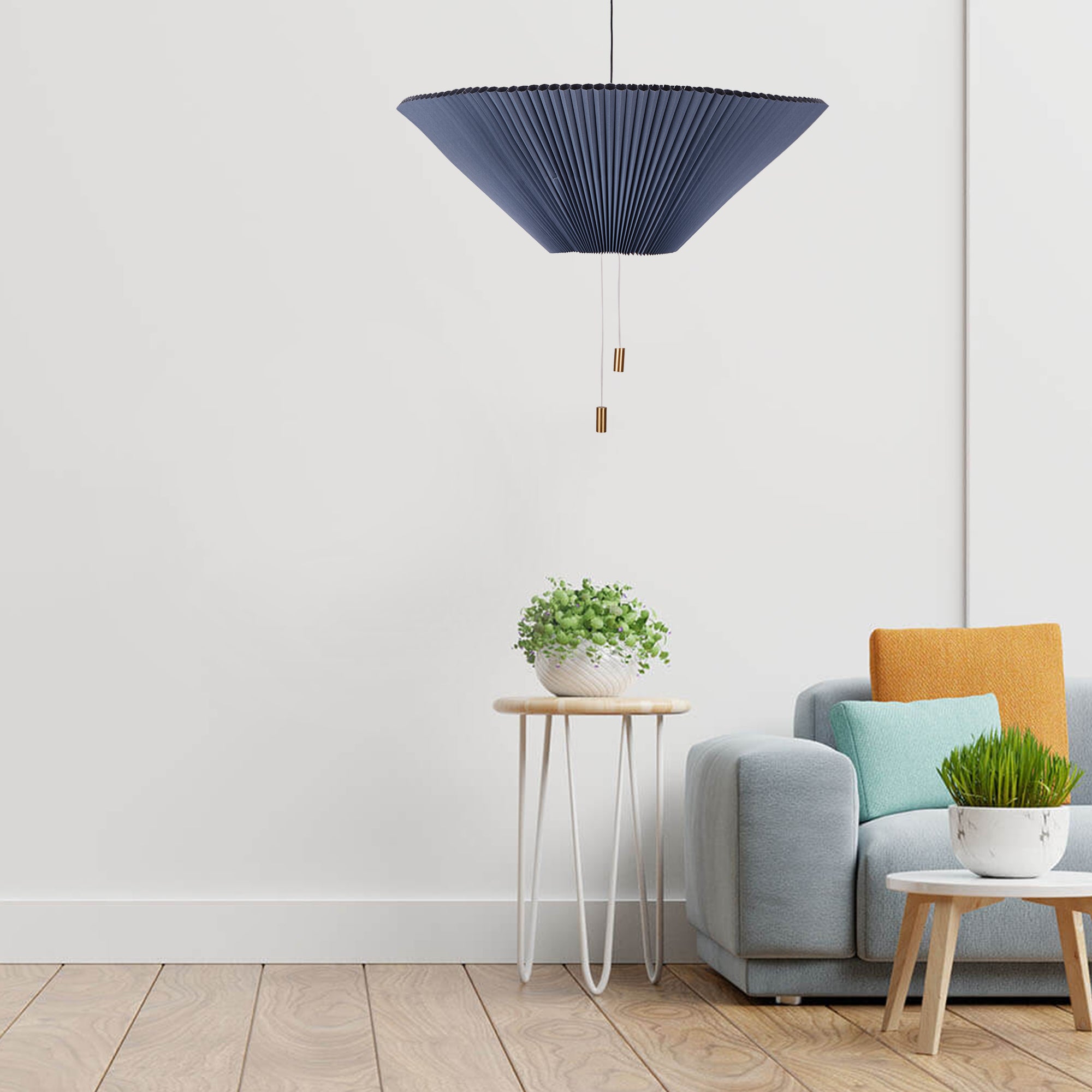 Shape Changing Pendant Lamp in blue, showcasing its adjustable origami-style design and elegant lighting.