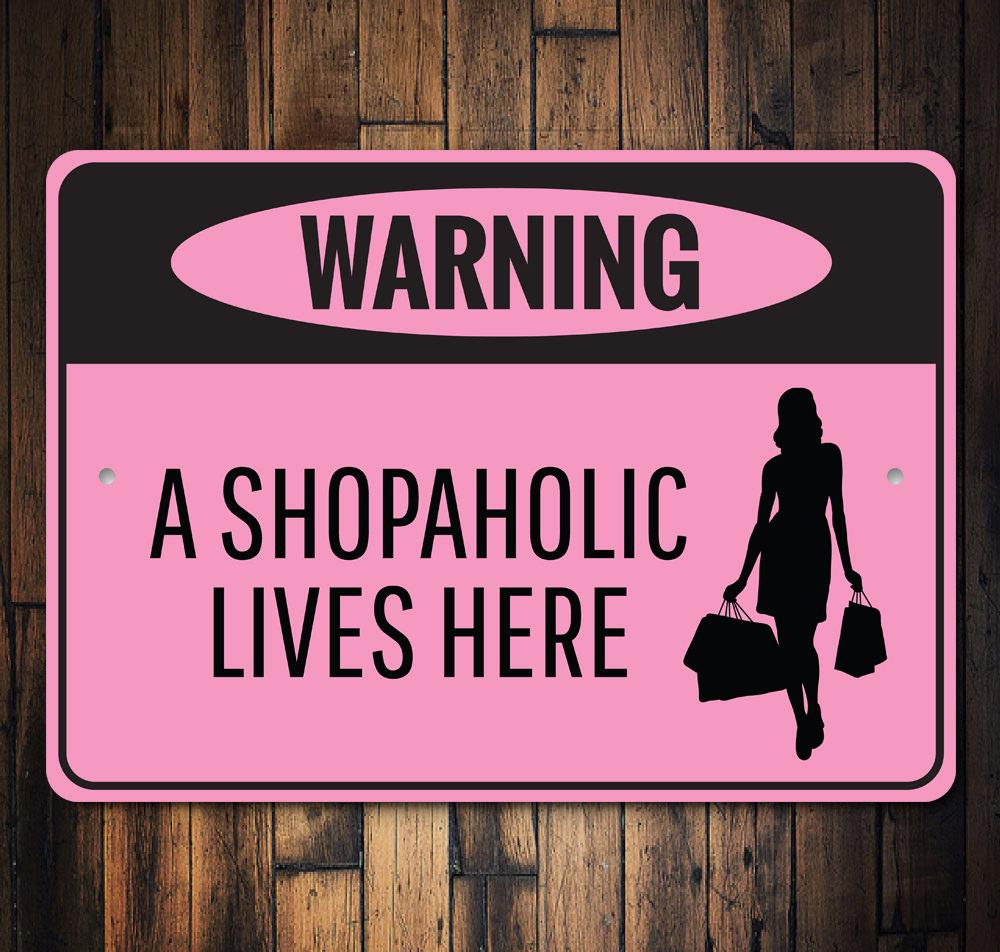 Shopaholic Sign made from high-quality aluminum, featuring vibrant colors and a stylish design, perfect for home decor.