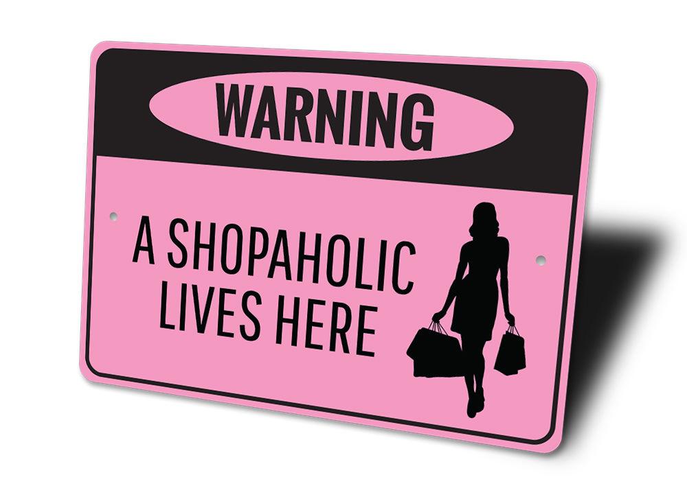 Shopaholic Sign made from high-quality aluminum, featuring vibrant colors and a stylish design, perfect for home decor.