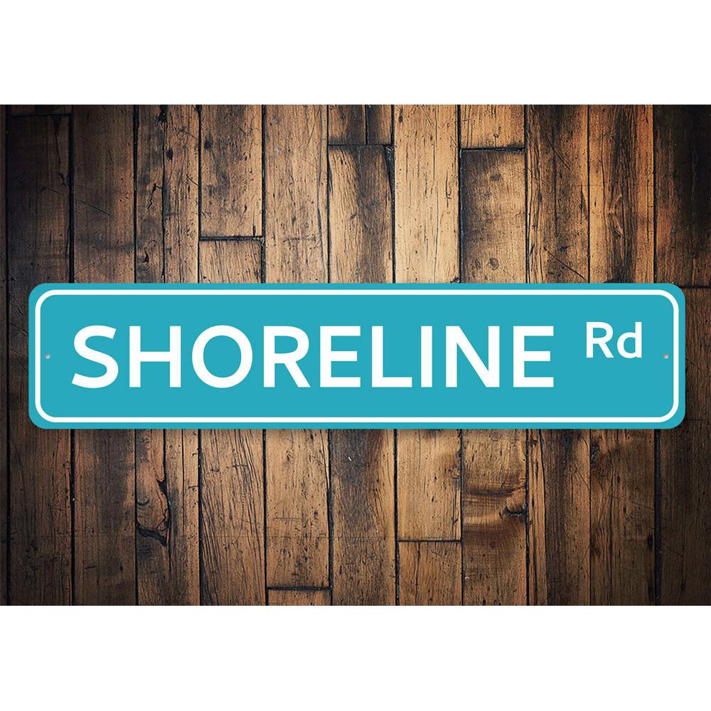 A decorative Shoreline Road Sign made from high-quality aluminum, featuring customizable text and pre-drilled holes for easy mounting.