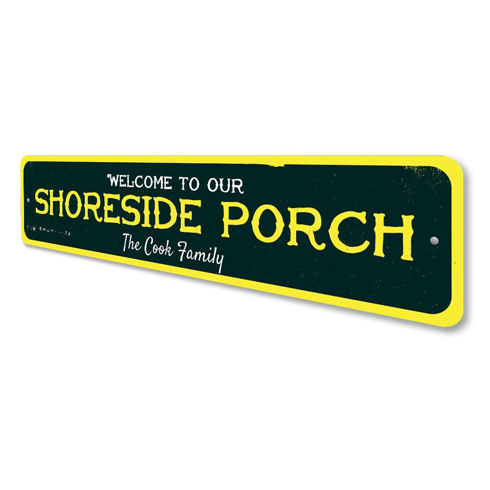 A beautifully crafted Shoreside Porch Sign made of aluminum, featuring beach-themed designs, perfect for coastal decor.