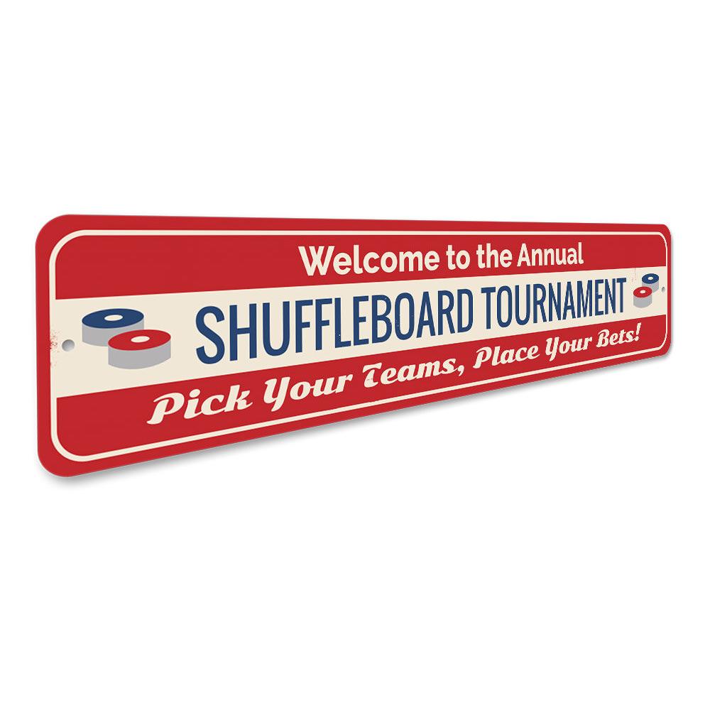 A decorative Shuffleboard Tournament Sign made of high-quality aluminum, featuring customizable text and pre-drilled holes for easy mounting.