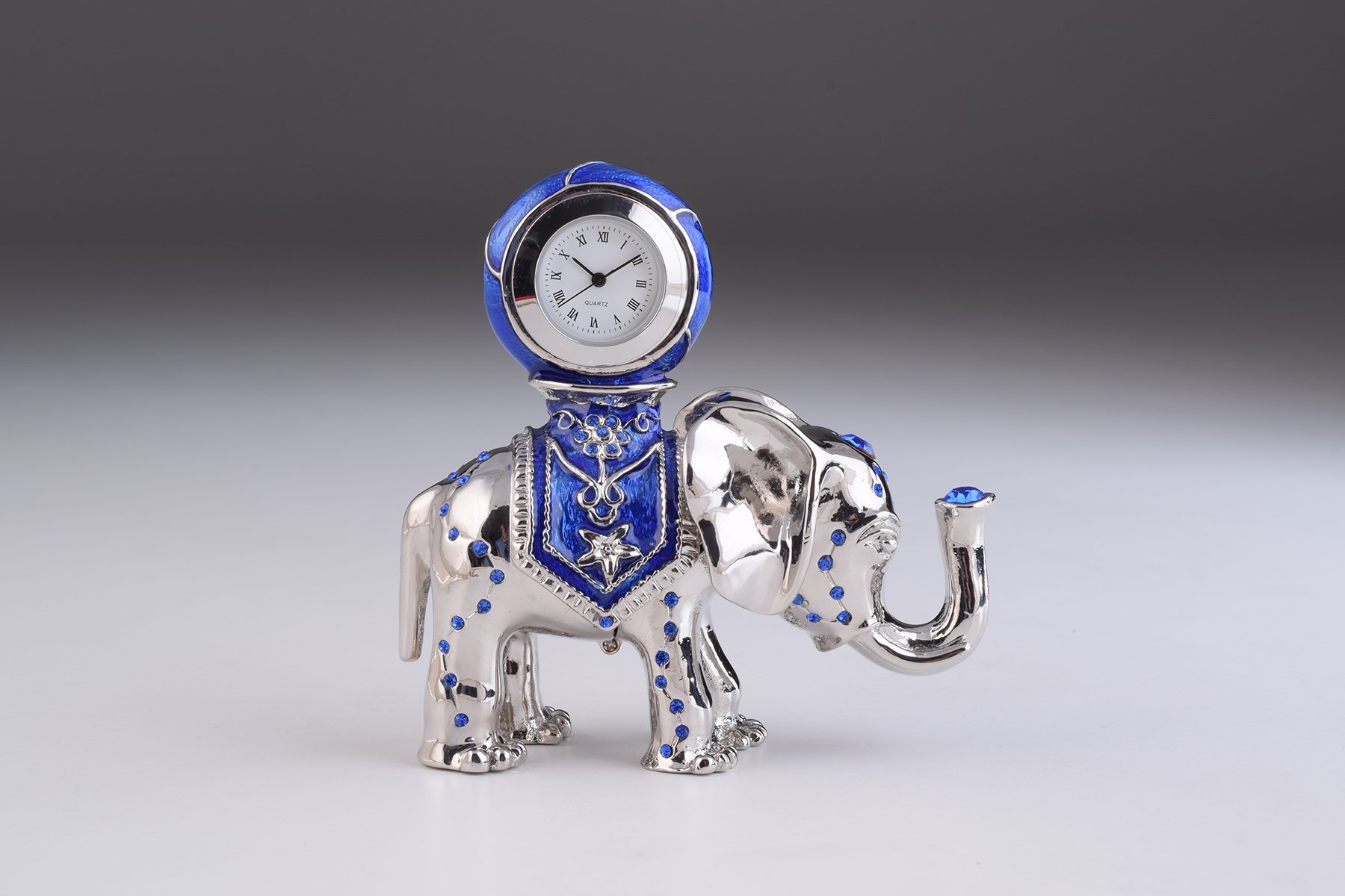 Handcrafted silver elephant trinket box with clock, adorned with Austrian crystals and plated in 24K gold or 925 silver.