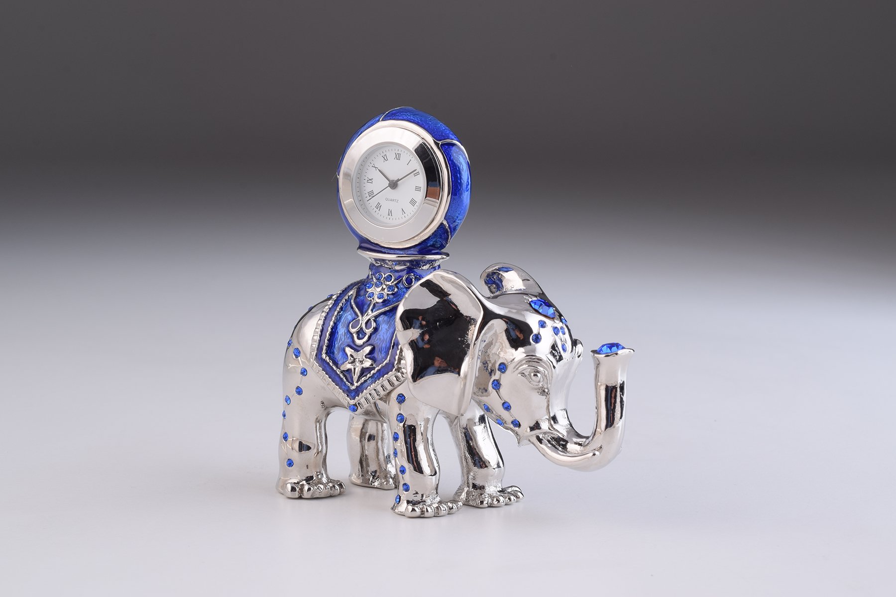 Handcrafted silver elephant trinket box with clock, adorned with Austrian crystals and plated in 24K gold or 925 silver.