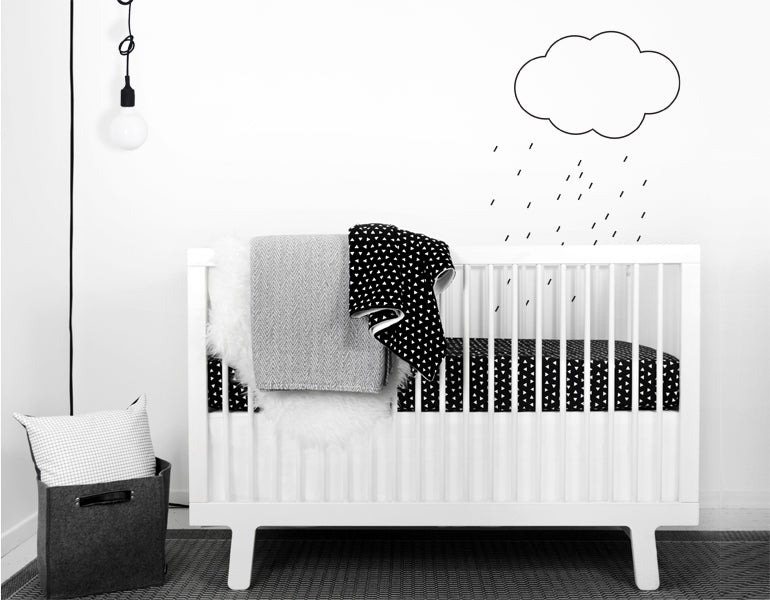 Singing in the Rain Wall Decal featuring a cloud and raindrops design, perfect for home decor.