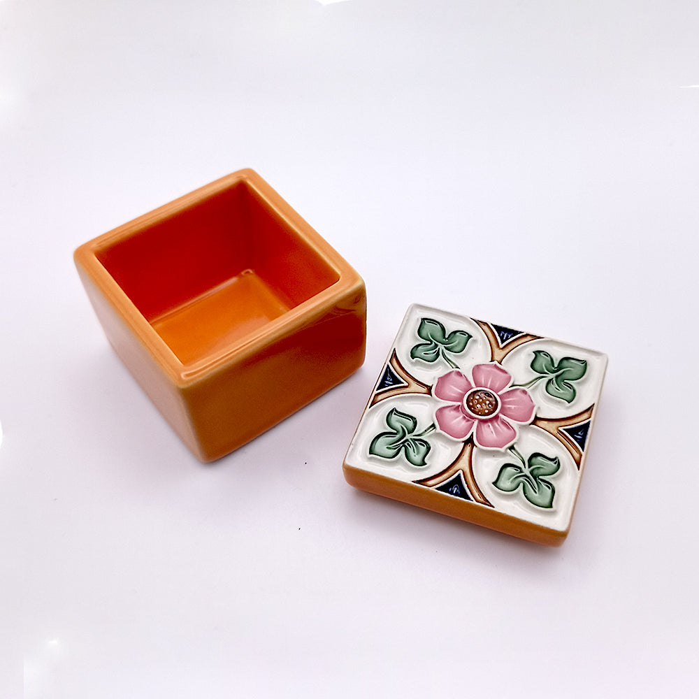 A beautifully handcrafted Sintra Ceramic Box featuring vibrant colors and intricate designs, perfect for home decor.