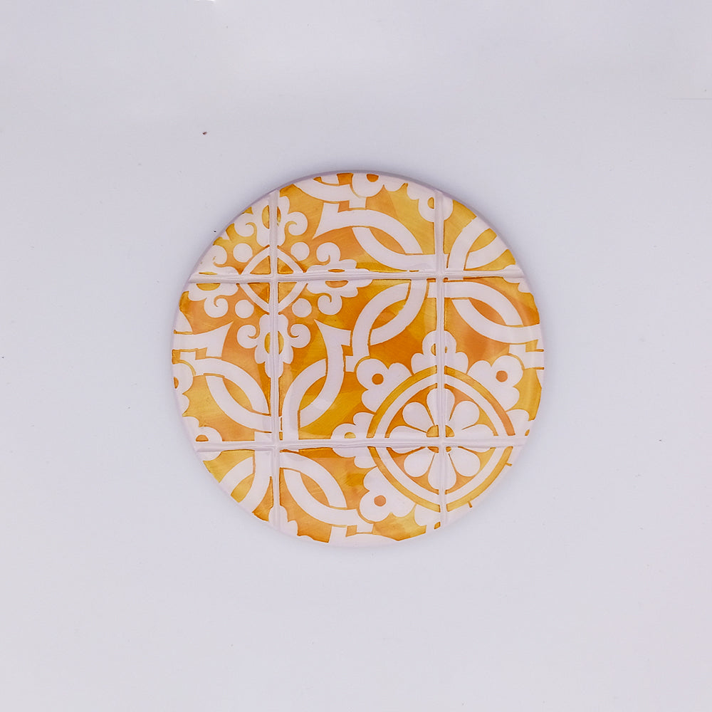 Hand-painted Sintra Ceramic Cup Pads showcasing vibrant colors and intricate designs, perfect for protecting surfaces.