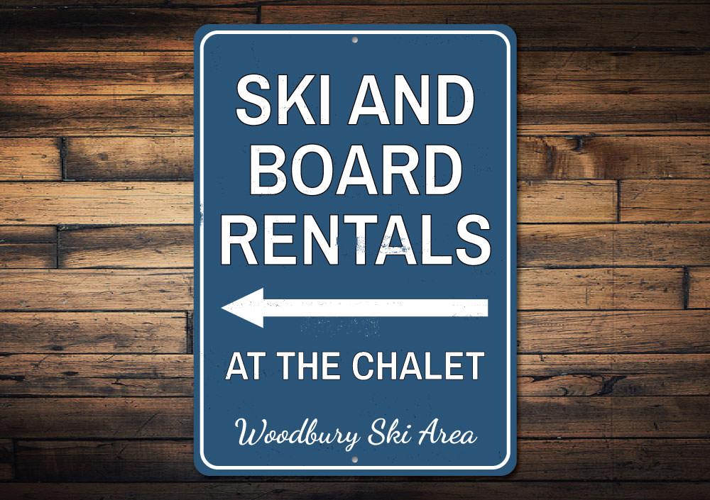 A decorative Ski & Board Rentals Sign made from high-quality aluminum, featuring customizable text and pre-drilled holes for easy mounting.