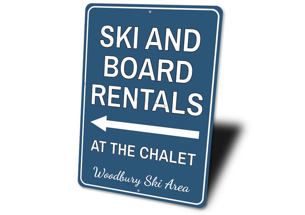 A decorative Ski & Board Rentals Sign made from high-quality aluminum, featuring customizable text and pre-drilled holes for easy mounting.