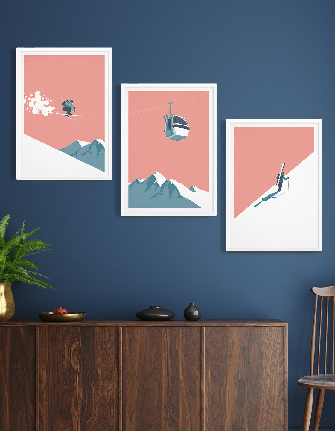 A contemporary set of three ski art prints showcasing winter landscapes and skiing action, perfect for home decor.