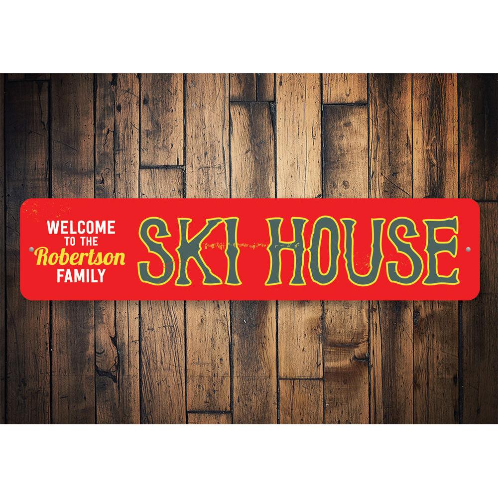 Customizable Ski House Sign made of high-quality aluminum, featuring a rustic design perfect for ski lovers and lodge decor.