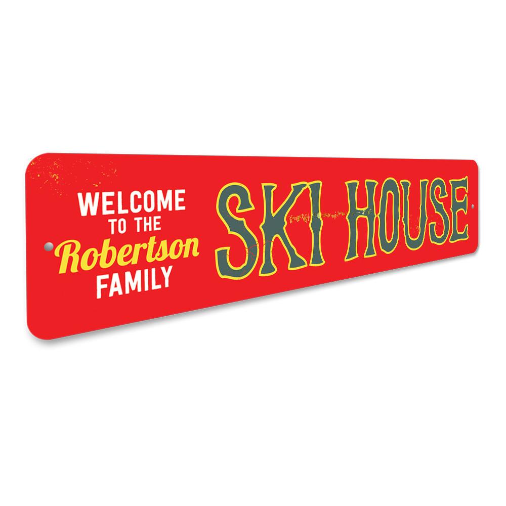 Customizable Ski House Sign made of high-quality aluminum, featuring a rustic design perfect for ski lovers and lodge decor.