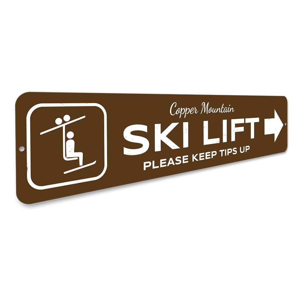 A decorative Ski Lift Directional Sign made of high-quality aluminum, featuring customizable text and pre-drilled holes for easy mounting.