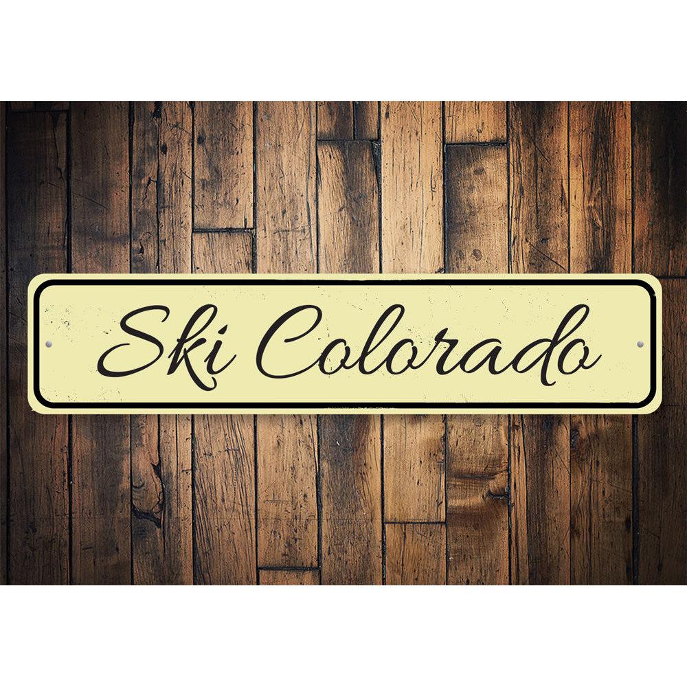 A customizable Ski Location Sign made of high-quality aluminum, featuring a scenic ski design, perfect for home decor.